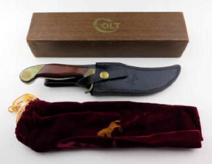 Colt U1130 All Purpose with a 5 in. blade and rosewood handle