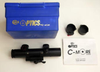 2000 Colt 4 x 21 Model D RFI scope, paperwork, lense covers, and Colt Optics box