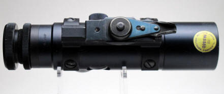 Colt early 3 x 20 scope with yellow inspection sticker
