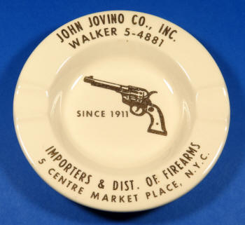 Ashtray advertisement for John Jovino's gun shop, N.Y.