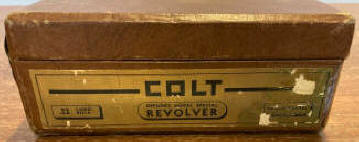 Yellowed Colt revolver data labels-2