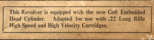 Sticker on top of Colt box promoting embedded cylinder head